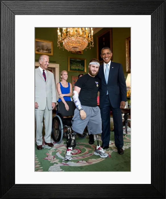 Framed Print : Petty Officer Taylor Morris was presented with a Purple Heart by Pres. Barack Obama. Morris also received a Bronze Star for valorous conduct Framed Print : Petty Officer Taylor Morris was presented with a Purple Heart by Pres. Barack Obama. Morris also received a Bronze Star for valorous conduct
