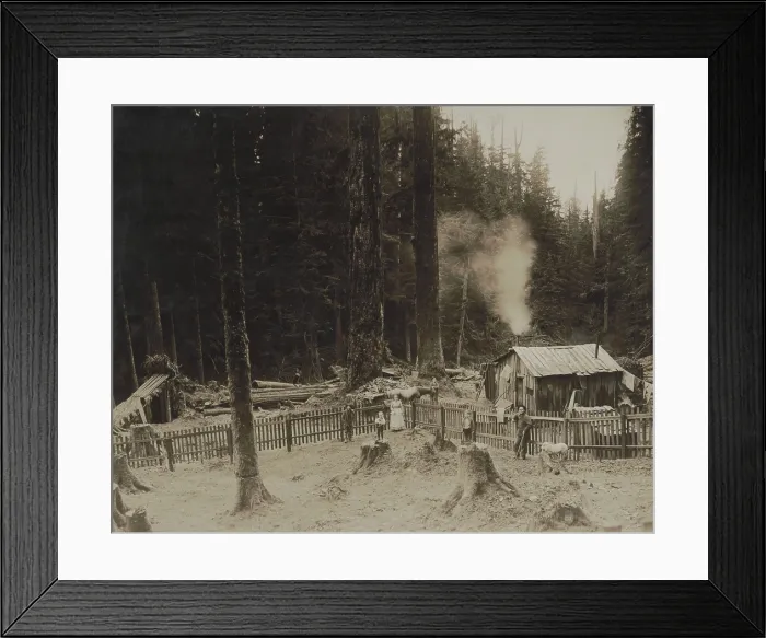 Framed Print : In Washingtons Cascade Mountains, three men, a woman, and two children pose by a small shack. There is a fence enclosed yard and drying laundry Framed Print : In Washingtons Cascade Mountains, three men, a woman, and two children pose by a small shack. There is a fence enclosed yard and drying laundry