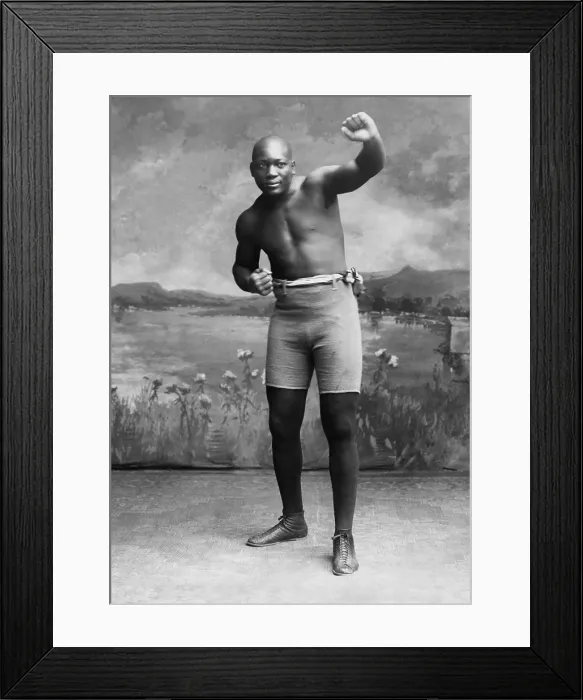 Framed Print : Studio portrait of boxer Jack Johnson, with fists in fighting stance, 1928 (BSLOC_2018_4_150)
