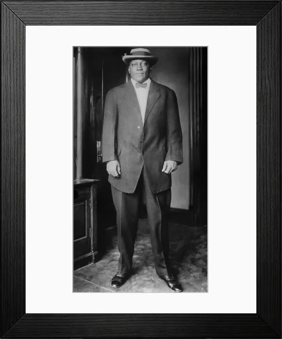 Framed Print : Boxer John Johnson, World Heavyweight Champion, in a business suit, bow tie, and felt hat, c. 1910-12 (BSLOC_2018_4_151)