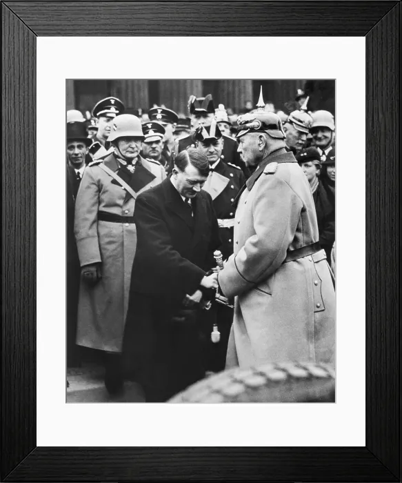 Framed Print : Newly appointed Chancellor Adolf Hitler greets President von Hindenburg at a memorial service. Berlin, 1933. Behind Hitler is Herman Goering and Joseph Goebbels