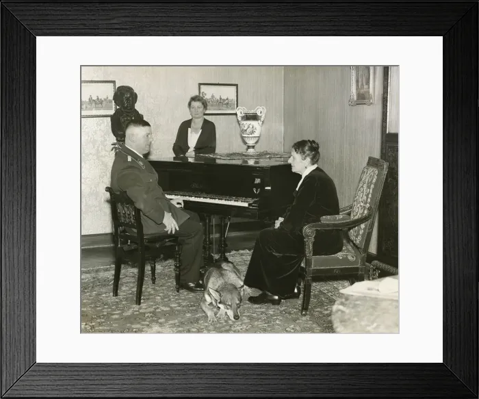 Framed Print : Ernst Roehm, Chief of Sturmabteilung (SA), with his mother, Emilie Roehm, ca. 1933. Standing beside the piano, his sister. (BSLOC_2015_13_46) Framed Print : Ernst Roehm, Chief of Sturmabteilung (SA), with his mother, Emilie Roehm, ca. 1933. Standing beside the piano, his sister. (BSLOC_2015_13_46)