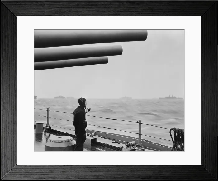 Framed Print : A sailor on a warship keeps alert watch over merchant ships in a convoy. U.S. warships protected convoys of 30 to 70 ships on the Atlantic during World War 2. Ca. 1941-45 Framed Print : A sailor on a warship keeps alert watch over merchant ships in a convoy. U.S. warships protected convoys of 30 to 70 ships on the Atlantic during World War 2. Ca. 1941-45