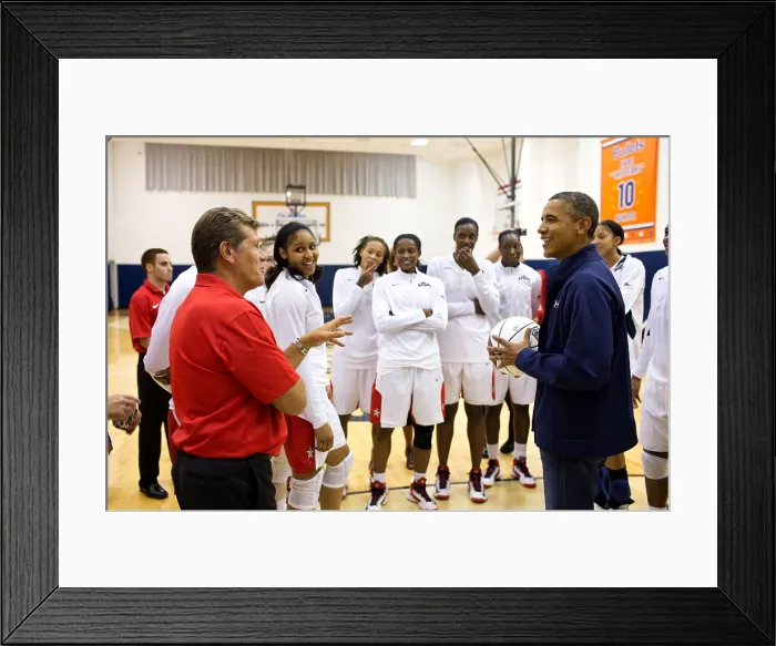 Framed Print : President Obama talks coach Geno Auriemma and the U.S. Women's Olympic basketball team. On July 16, 2012, following their 99-67 win over Brazil in Washington, D.C Framed Print : President Obama talks coach Geno Auriemma and the U.S. Women's Olympic basketball team. On July 16, 2012, following their 99-67 win over Brazil in Washington, D.C