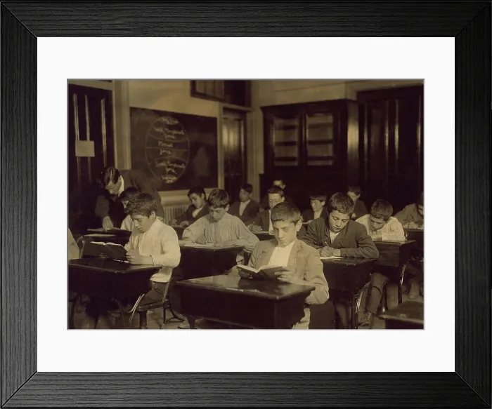 Framed Print : Immigrant boys in night school in Boston Massachusetts, many of whom were unable to attend day classes because they worked during the day. Photograph by Lewis Hine, October 1909