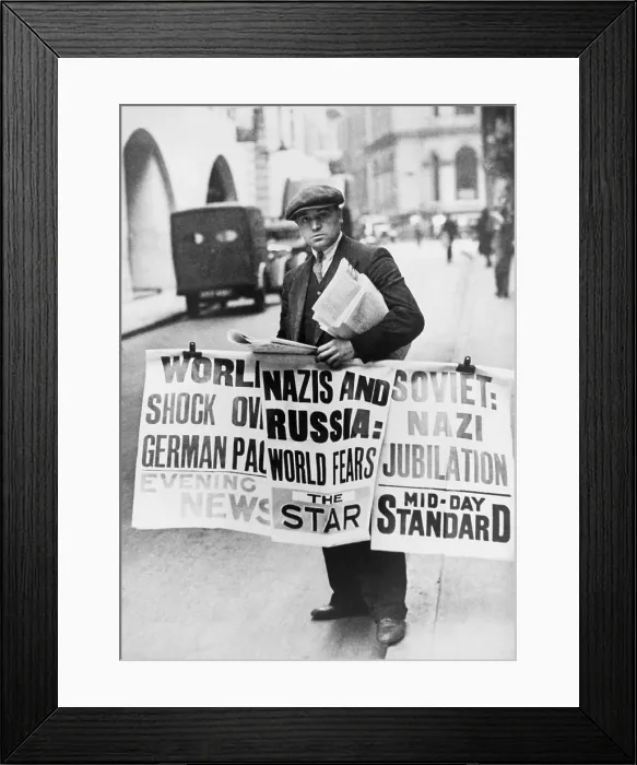 Framed Print : British man holding newspapers and large signs announcing Nazi German- Soviet Russian non-aggression pact. London, England. Aug. 24, 1939. (BSLOC_2014_7_54) Framed Print : British man holding newspapers and large signs announcing Nazi German- Soviet Russian non-aggression pact. London, England. Aug. 24, 1939. (BSLOC_2014_7_54)