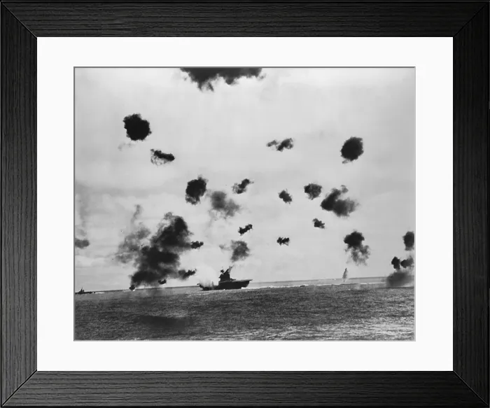 Framed Print : American aircraft carrier USS Yorktown hit by a Japanese bomb in the Battle of Midway, June 4, 1942. A torpedo attack later that day crippled the ship, which sunk on June 7 Framed Print : American aircraft carrier USS Yorktown hit by a Japanese bomb in the Battle of Midway, June 4, 1942. A torpedo attack later that day crippled the ship, which sunk on June 7
