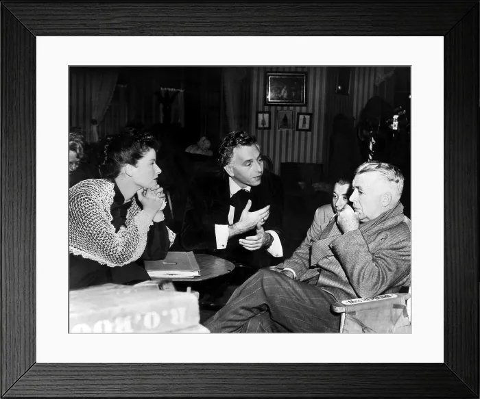 Framed Print : SONG OF LOVE, Katharine Hepburn, Paul Henreid, director Clarence Brown, on set, 1947. Courtesy: CSU Archives / Everett Collection