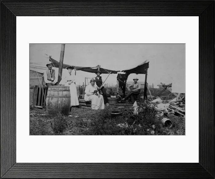 Framed Print : Three men and two women holding down a lot in Guthrie during the Land Rush of April 1889. Guthrie was a stop on the new railroad and land office location with a post office
