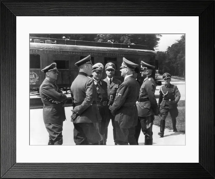 Framed Print : Adolf Hitler in Compiegne, France. He speaks with German generals in front of same train carriage in which the 1918 World War 1 Armistice had been signed Framed Print : Adolf Hitler in Compiegne, France. He speaks with German generals in front of same train carriage in which the 1918 World War 1 Armistice had been signed