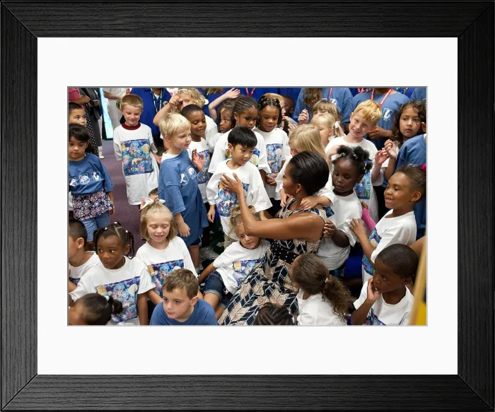 Framed Print : First Lady Michelle Obama greets children at Naval Air Station Oceana Summer Camp. Virginia Beach, Va. July 21, 2011. (BSLOC_2015_3_32) Framed Print : First Lady Michelle Obama greets children at Naval Air Station Oceana Summer Camp. Virginia Beach, Va. July 21, 2011. (BSLOC_2015_3_32)