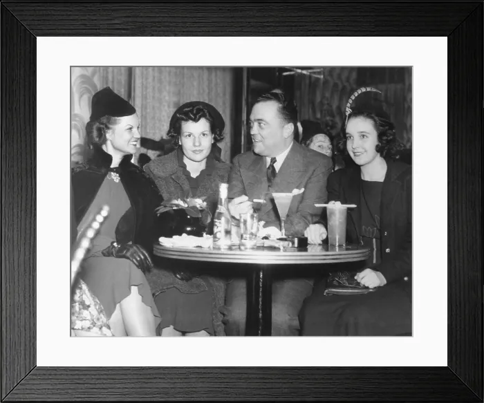 Framed Print : FBI Director J. Edgar Hoover at the Stork Club with three young women. At right is 1930's supermodel, Marion Morehouse. Ca. 1934-1940. (BSLOC_2014_7_75)