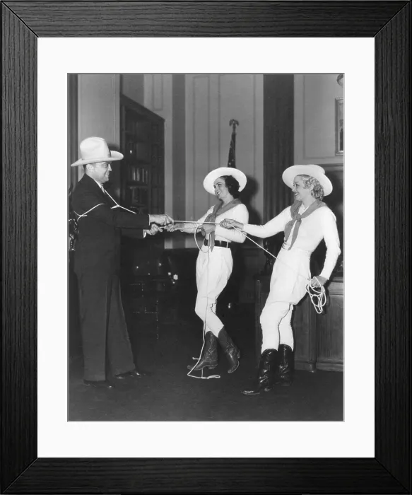 Framed Print : FBI Director J. Edgar Hoover is lassoed by Texas Rangerettes at the Texas Expo. Ca. 1935-1940. (BSLOC_2014_7_77) Framed Print : FBI Director J. Edgar Hoover is lassoed by Texas Rangerettes at the Texas Expo. Ca. 1935-1940. (BSLOC_2014_7_77)