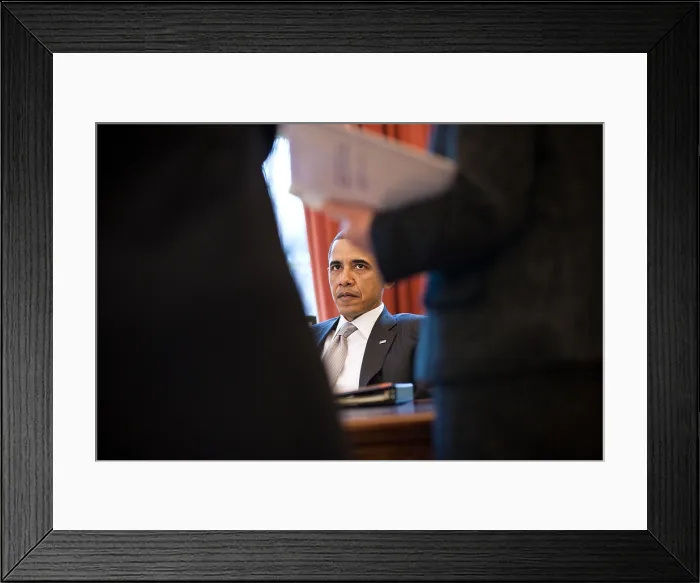 Framed Print : President Barack Obama talks with advisors in the Oval Office, April 4, 2011. (BSLOC_2015_3_4)