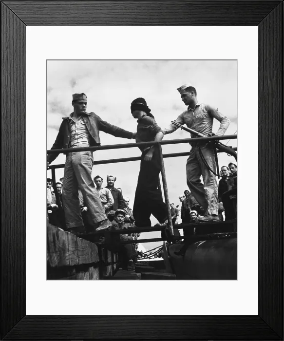 Framed Print : U.S. Marines unloading a Japanese POW from a submarine returned from war patrol. May 1945. World War 2. (BSLOC_2013_14_276) Framed Print : U.S. Marines unloading a Japanese POW from a submarine returned from war patrol. May 1945. World War 2. (BSLOC_2013_14_276)