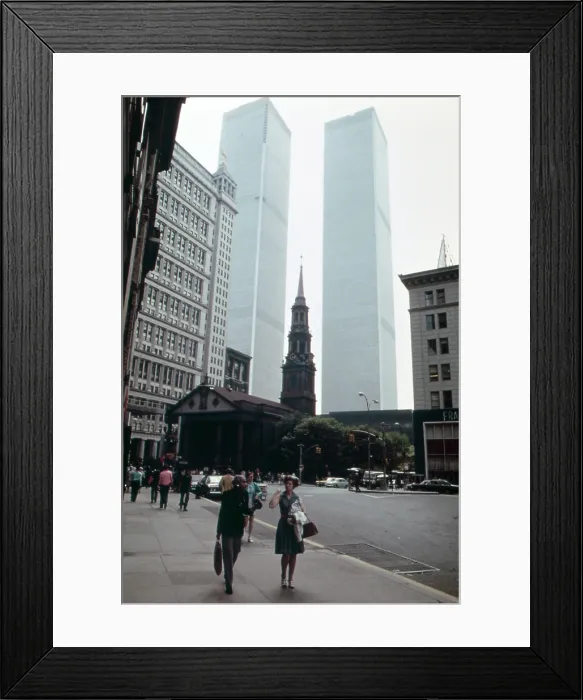 Framed Print : Historic St. Paul's Chapel, built in 1766, on Lower Broadway in the Financial District. Behind looms the Twin Towers of the World Trade Center Framed Print : Historic St. Paul's Chapel, built in 1766, on Lower Broadway in the Financial District. Behind looms the Twin Towers of the World Trade Center