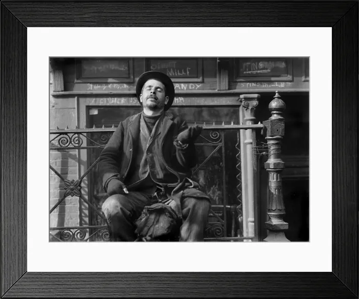 Framed Print : Pleading beggar holds his hand out on the street in New York City, 1910 (BSLOC_2018_1_136)