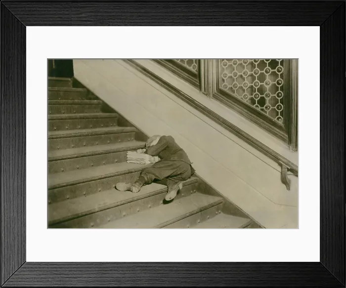 Framed Print : Very young newsboy sleeps on stairs with papers, Jersey City, New Jersey, Feb. 1912