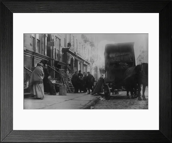 Framed Print : New York City family being evicted from their tenement apartment, c. 1905-10 Framed Print : New York City family being evicted from their tenement apartment, c. 1905-10