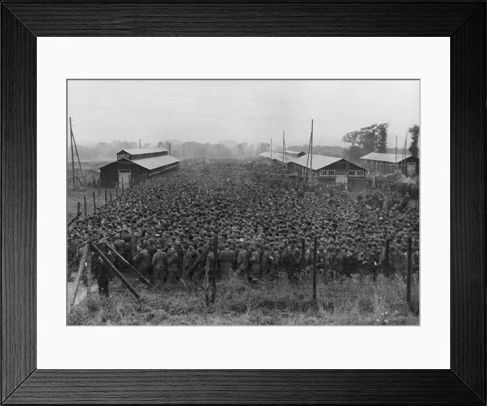 Framed Print : 10, 000 German prisoners of war line up for lunch at an enclosure in France. The POWs were captured in the 1944 Allied drive through France, during World War 2. (BSLOC_2013_14_288) Framed Print : 10, 000 German prisoners of war line up for lunch at an enclosure in France. The POWs were captured in the 1944 Allied drive through France, during World War 2. (BSLOC_2013_14_288)