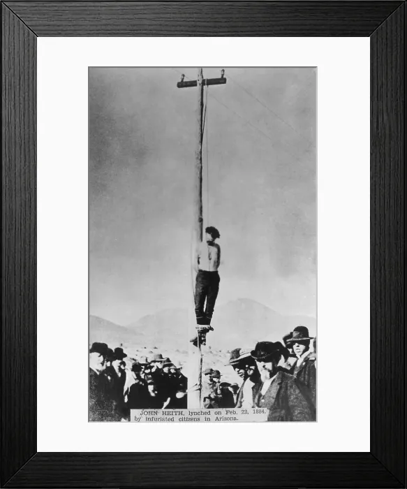 Framed Print : Body of lynched John Heith hangs from telegraph pole in Tombstone Arizona, Feb. 22, 1884. He was convicted of planning the robbery that became the Bisbee Massacre of Dec Framed Print : Body of lynched John Heith hangs from telegraph pole in Tombstone Arizona, Feb. 22, 1884. He was convicted of planning the robbery that became the Bisbee Massacre of Dec