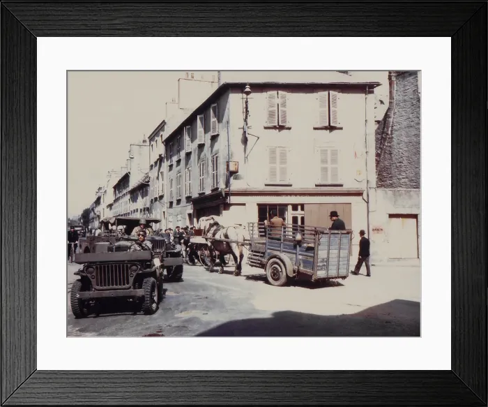 Framed Print : Cherbourg street traffic after liberation from German occupation. Local civilian and military vehicles crowd the Place de la Republique. June 27-30, 1944 Framed Print : Cherbourg street traffic after liberation from German occupation. Local civilian and military vehicles crowd the Place de la Republique. June 27-30, 1944