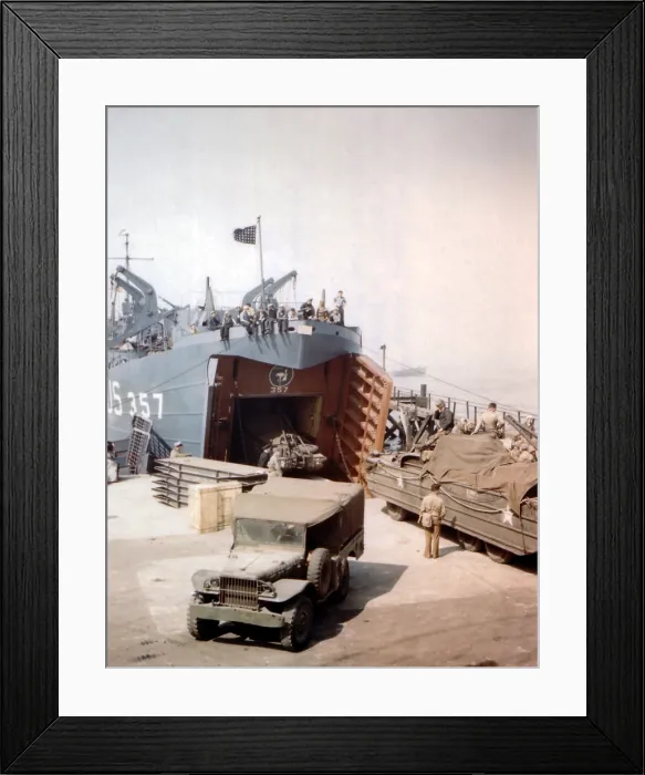 Framed Print : Loading a Landing Ship in Portland, England, before the D-Day invasion. Vehicles include a Dodge WC 51 and GMC DUKW 353 to be delivered to Omaha Beach. June 1944, World War 2
