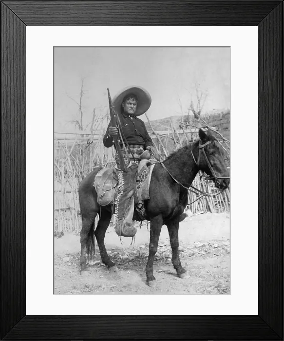Framed Print : Peon rebel volunteer mounted on a small horse, in the Mexican Revolution, c. 1910-1919. Equipped with a rifle, he wears buckled chaps and a wide sombrero (BSLOC_2016_13_60.jpg ) Framed Print : Peon rebel volunteer mounted on a small horse, in the Mexican Revolution, c. 1910-1919. Equipped with a rifle, he wears buckled chaps and a wide sombrero (BSLOC_2016_13_60.jpg )