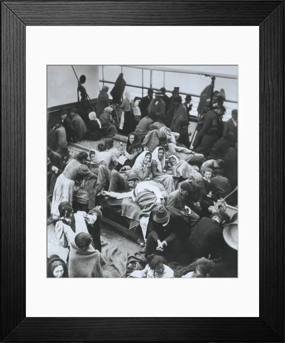 Framed Print : European immigrants huddled on the deck of a passenger ship sailing to America