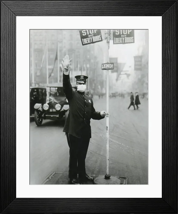 Framed Print : Spanish Flu Epidemic 1918-1919 in America. Traffic policeman in New York City wearing a gauze mask for protection against influenza. Oct. 16, 1918 (BSLOC_2016_11_110) Framed Print : Spanish Flu Epidemic 1918-1919 in America. Traffic policeman in New York City wearing a gauze mask for protection against influenza. Oct. 16, 1918 (BSLOC_2016_11_110)