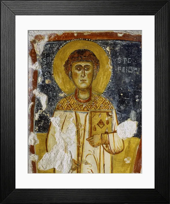 Framed Print : Saint Stephan, by Unknown Artist, 11th Century ca. fresco - Italy, Puglia, Mottola, Rocky Church of Saint Margaret. Detail. The holy man holding a book in his hand