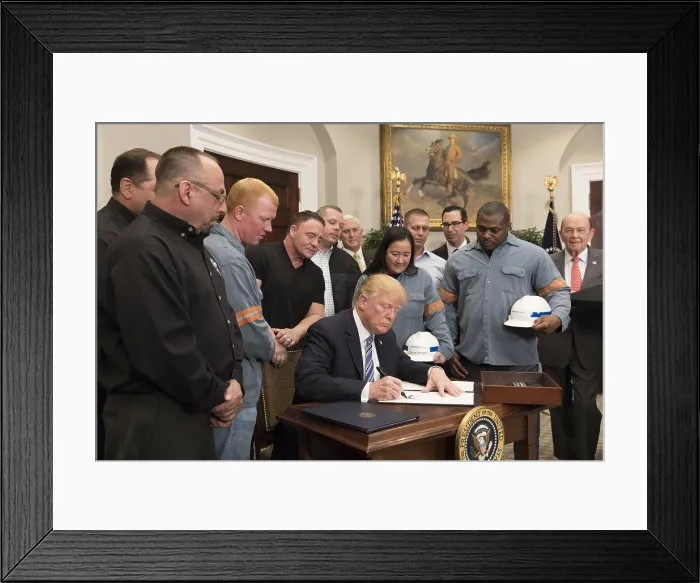 Framed Print : President Donald Trump signs an executive order imposing tariffs on steel and aluminum imports