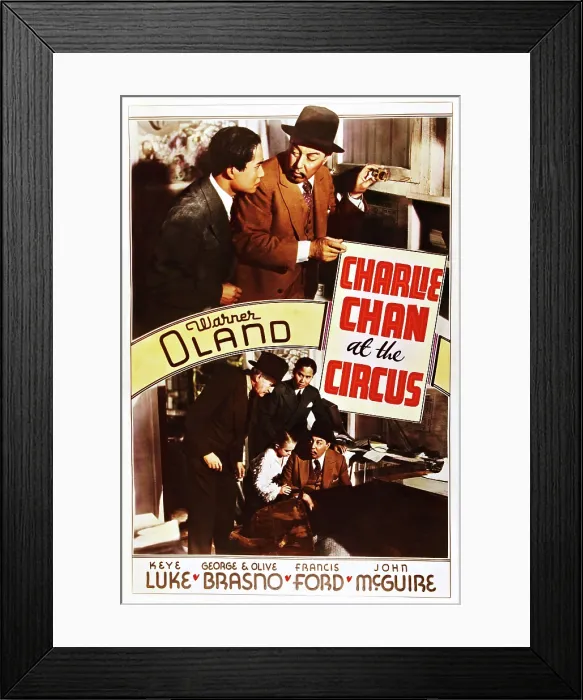 Framed Print : CHARLIE CHAN AT THE CIRCUS, top l-r: Keye Luke, Warner Oland, bottom upper right: Keye Luke, lower right: Warner Oland on poster art, 1936 Framed Print : CHARLIE CHAN AT THE CIRCUS, top l-r: Keye Luke, Warner Oland, bottom upper right: Keye Luke, lower right: Warner Oland on poster art, 1936