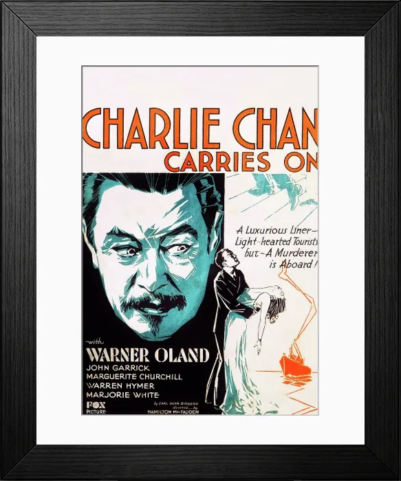 Framed Print : CHARLIE CHAN CARRIES ON, Warner Oland on US poster art, 1931. TM & copyright 20th Century Fox Film Corp. All rights reserved / courtesy Everett Collection