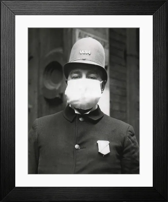 Framed Print : Spanish Flu Epidemic 1918-1919 in America. Policeman in Seattle, Washington, wearing mask provided by the Red Cross to prevent the spread of influenza. Oct
