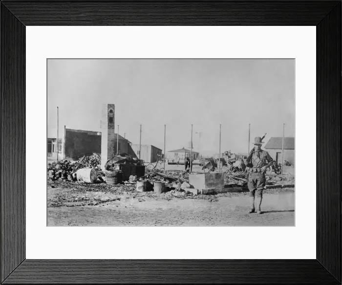 Framed Print : US soldier guards ruins in Columbus, New Mexico, after Pancho Villas raid of March 9, 1916