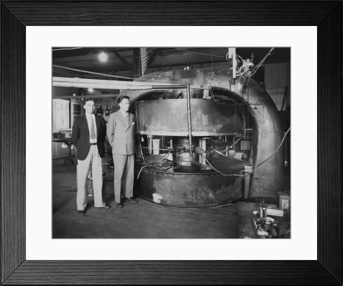 Framed Print : Stanley Livingston (left) and Ernest Lawrence with the 27-inch cyclotron in 1934. At the Radiation Laboratory at the University of California, Berkeley in 1934