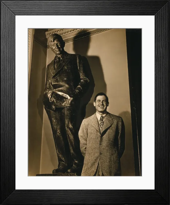 Framed Print : Portrait of Will Rogers, Jr. half-length, next to a statue of his father in the U.S. Capitol. Will Rogers Sr Framed Print : Portrait of Will Rogers, Jr. half-length, next to a statue of his father in the U.S. Capitol. Will Rogers Sr