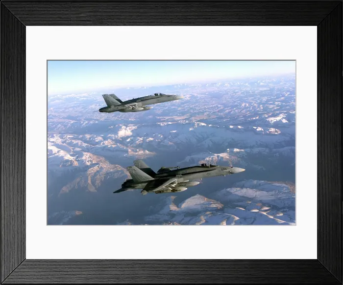 Framed Print : Two Navy F-18 Hornet fighters patrol the skies over Afghanistan's mountainous landscape during the first months of the U.S. military response to the Sept