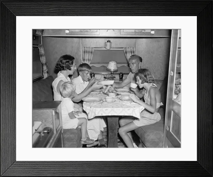 Framed Print : American family dining at the table in their Trailer Camper. June 4, 1937