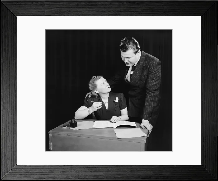 Framed Print : Couple working out budget, ca. 1940. This is an early commercial stock photo produced to meet the needs of the growing print advertising business. (BSLOC_2015_14_147)