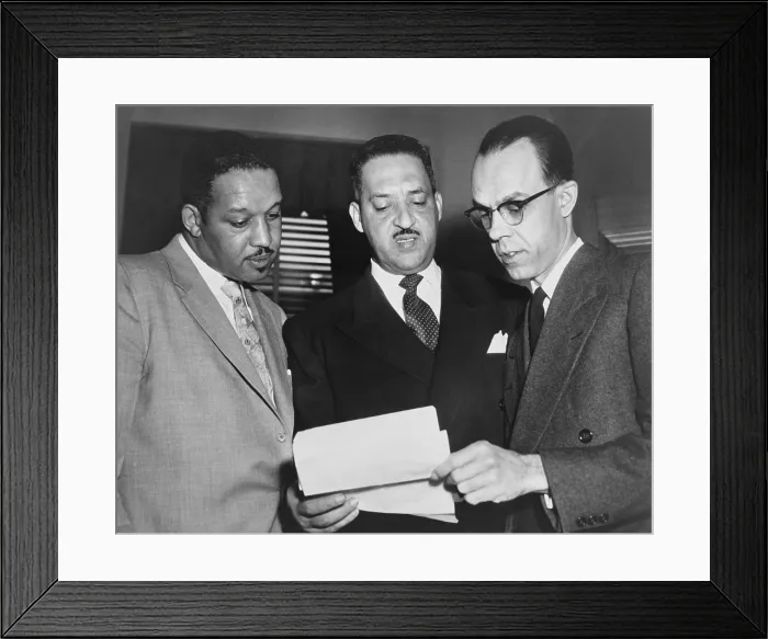 Framed Print : Lawyers confer at the Supreme Court prior to presenting arguments against school segregation