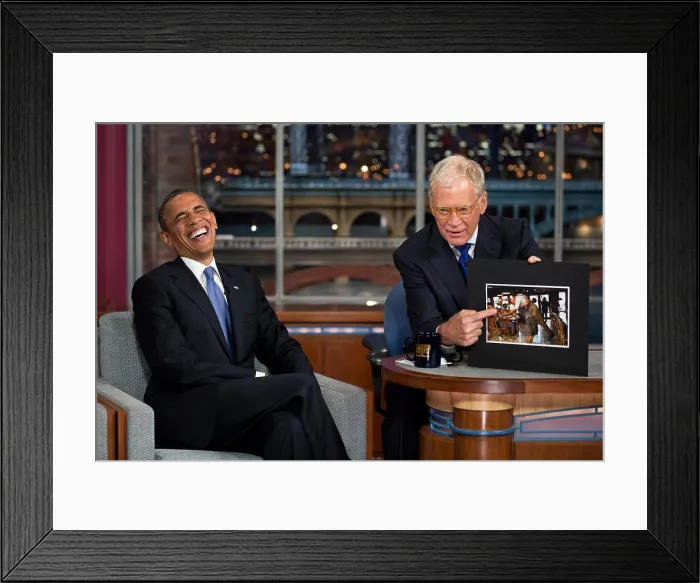 Framed Print : President Barack Obama reacts to a photograph while taping of Late Show with David Letterman'. Sept. 18, 2012. (BSLOC_2015_3_110)