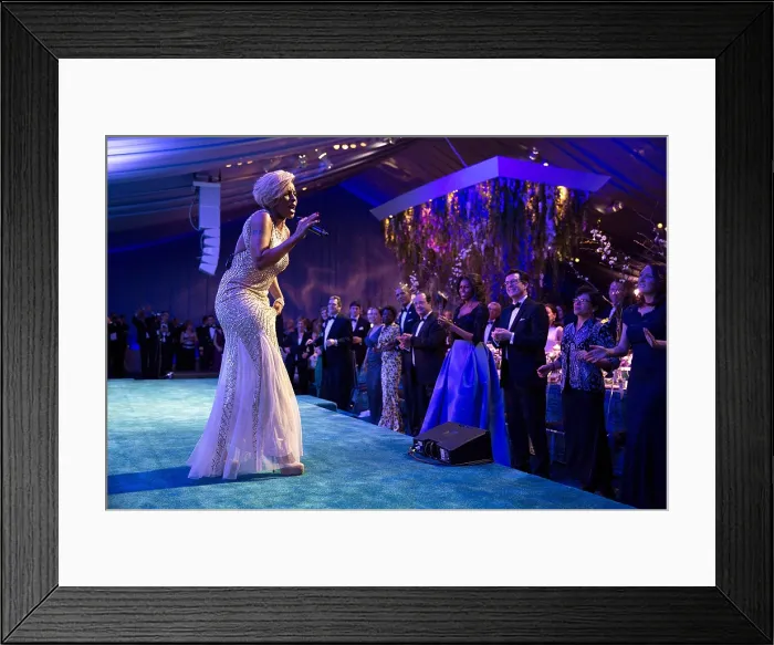 Framed Print : Singer Mary J. Blige performs during the State Dinner for President Francois Hollande of France. Feb. 11, 2014. Michelle wears a Carolina Herrera gown. (BSLOC_2015_3_102)