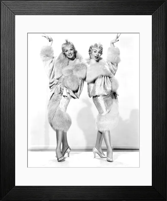 Framed Print : GENTLEMEN MARRY BRUNETTES, from left, Jane Russell, Jeanne Crain, in costumes by William Travilla, 1955