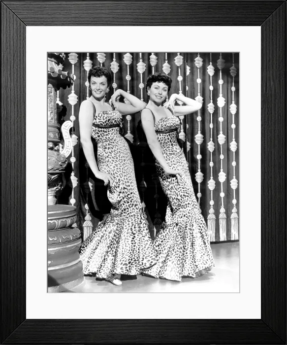 Framed Print : GENTLEMEN MARRY BRUNETTES, from left, Jane Russell, Jeanne Crain, in costumes by William Travilla, 1955
