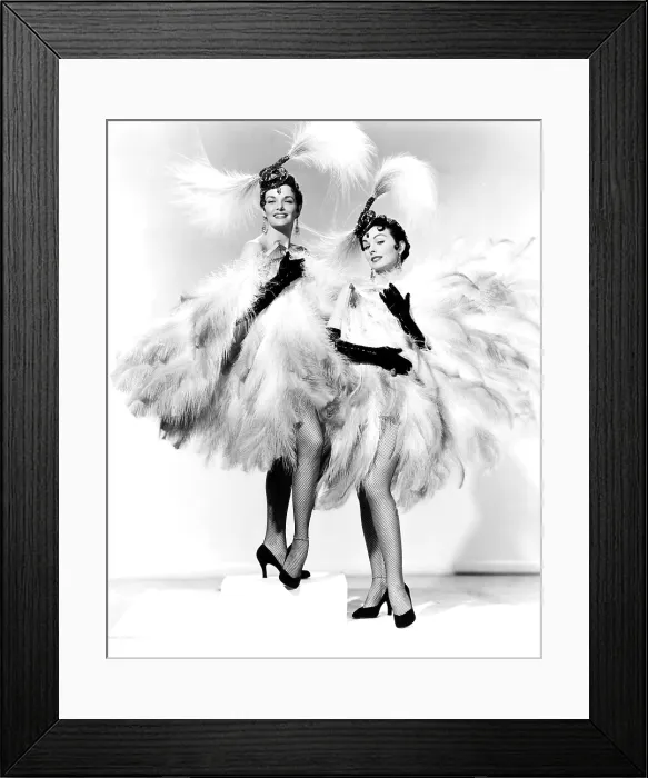 Framed Print : GENTLEMEN MARRY BRUNETTES, from left, Jane Russell, Jeanne Crain, in costumes by William Travilla, 1955