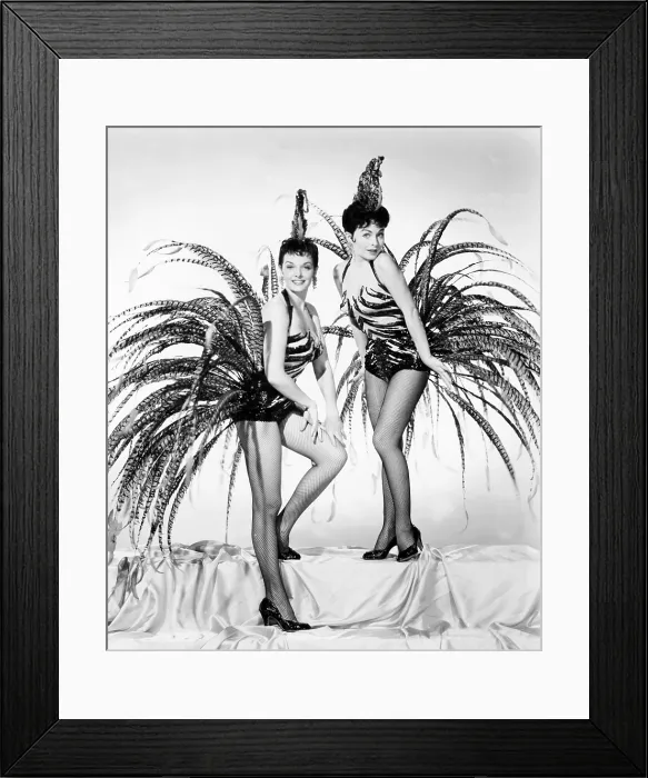 Framed Print : GENTLEMEN MARRY BRUNETTES, from left, Jane Russell, Jeanne Crain, in costumes by William Travilla, 1955