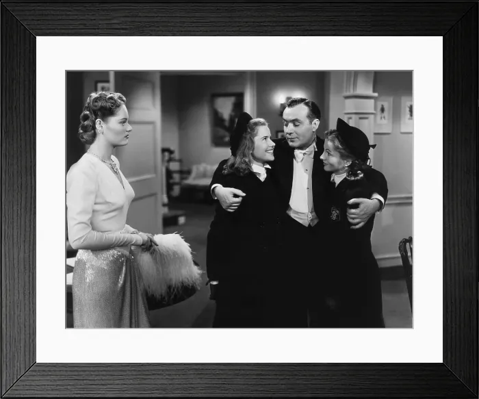 Framed Print : THE CONSTANT NYMPH, from left, Alexis Smith, Joyce Reynolds, Charles Boyer, Joan Fontaine, 1943