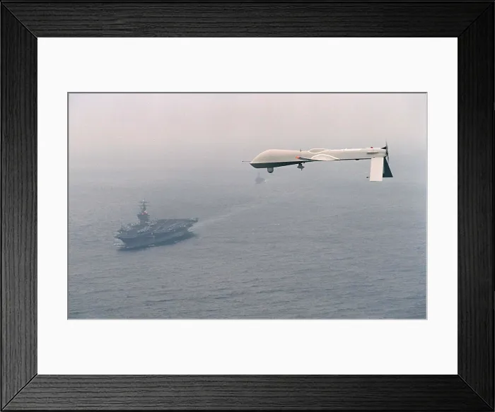 Framed Print : Predator Unmanned Aerial Vehicle flies above the aircraft carrier USS Carl Vinson on a Navy aerial reconnaissance test flight off the coast of California. Dec. 5 1995 Framed Print : Predator Unmanned Aerial Vehicle flies above the aircraft carrier USS Carl Vinson on a Navy aerial reconnaissance test flight off the coast of California. Dec. 5 1995
